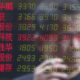 Asia stocks mixed; Chinese shares surge on report of gradual Trump tariffs