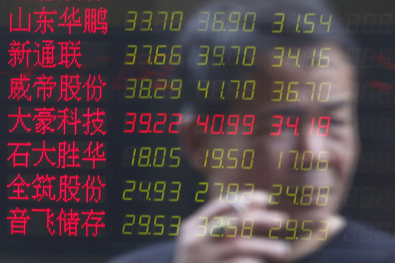 Asia stocks mixed; Chinese shares surge on report of gradual Trump tariffs